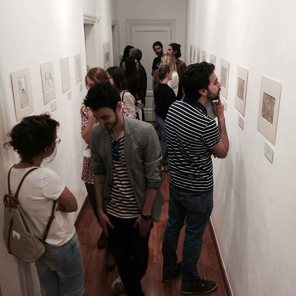 Artworks hanging in the hallway gallery